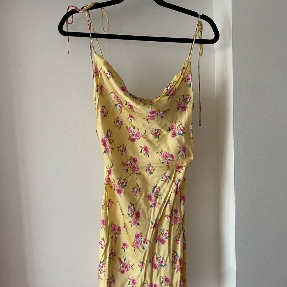 New w/o tags. Yellow mini slip dress